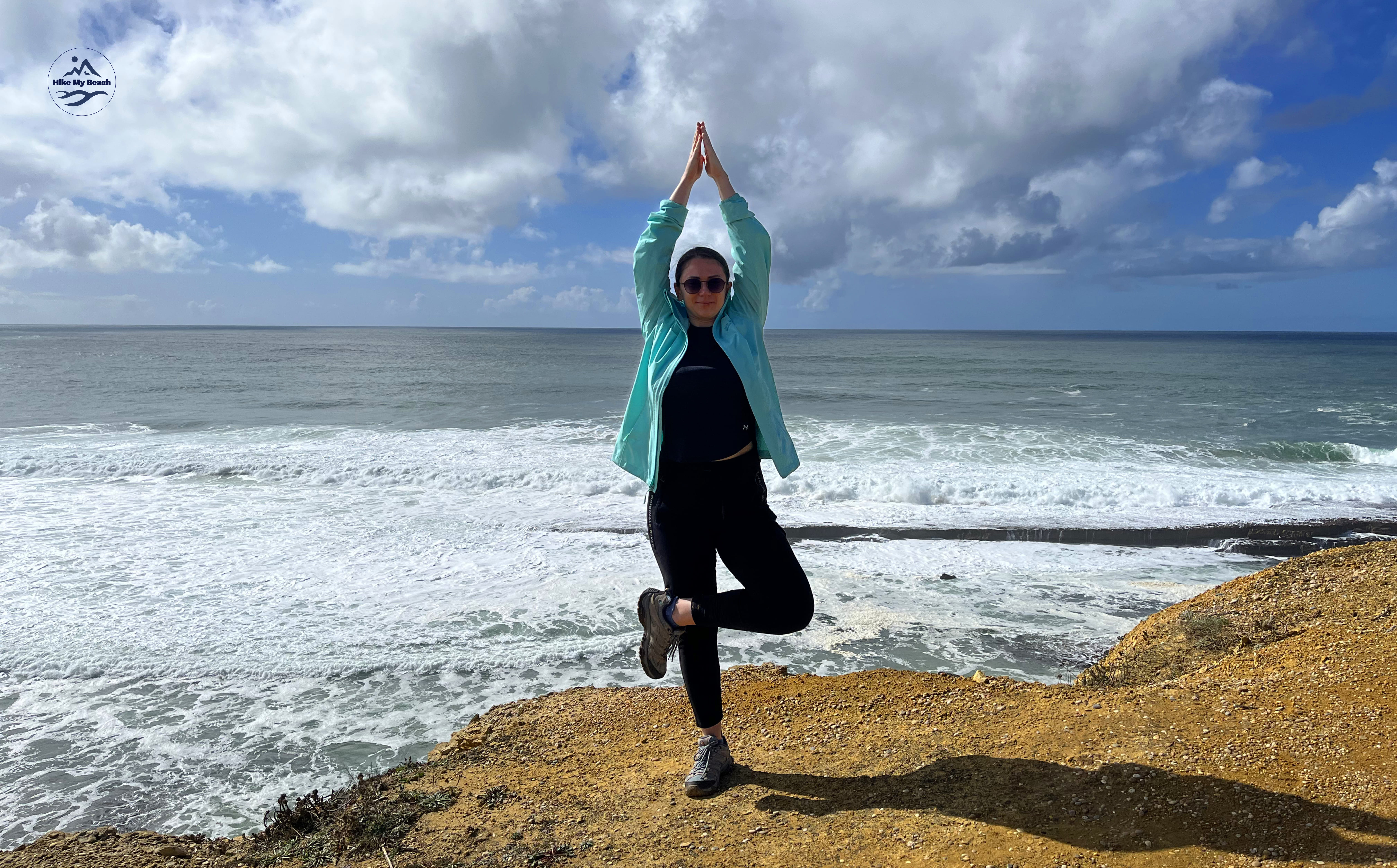 woman doing tree pose in yoga